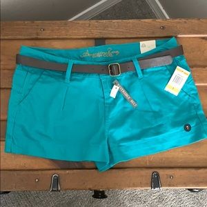 Teal shorts by American Rag with reversible belt 7